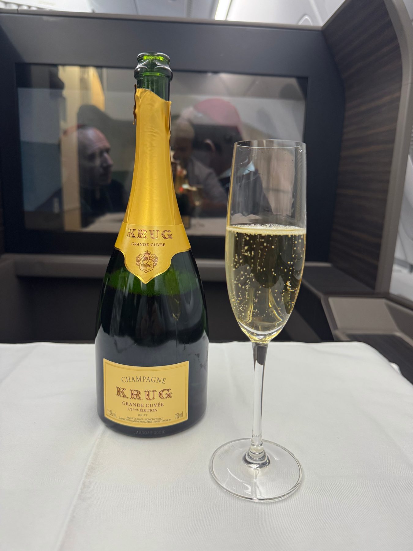 A bottle of Krug and a flute in ANA First Class