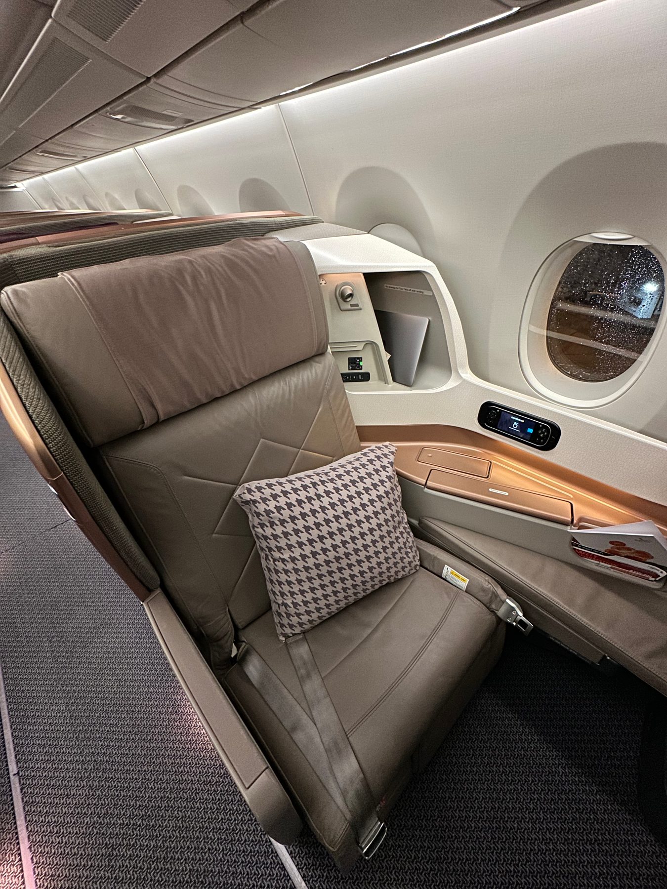 Singapore Airlines business class seat by the window